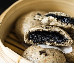Image Vege Black Sesame Pau 莱素麦片黑芝麻包 (fillings like tang yuan)